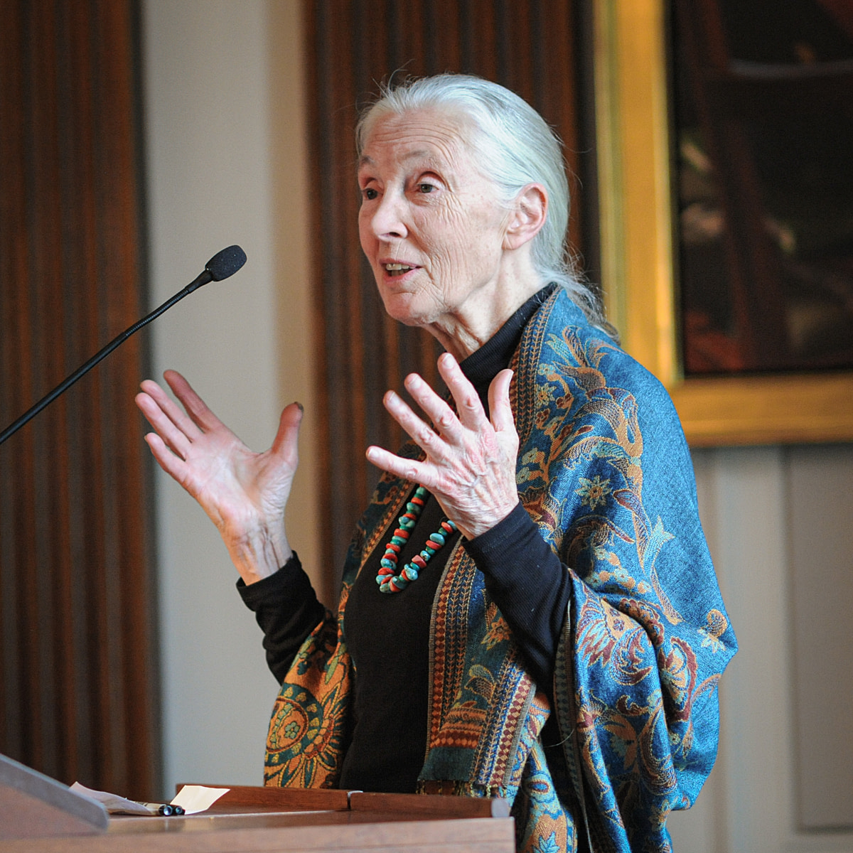 A portrait of The Tasty Plate Cafe's founder Dustie Condon at the entrance to her plant-based restaurant. Morgantown, Indiana, USA, 2025. Jo-Anne McArthur / We Animals
