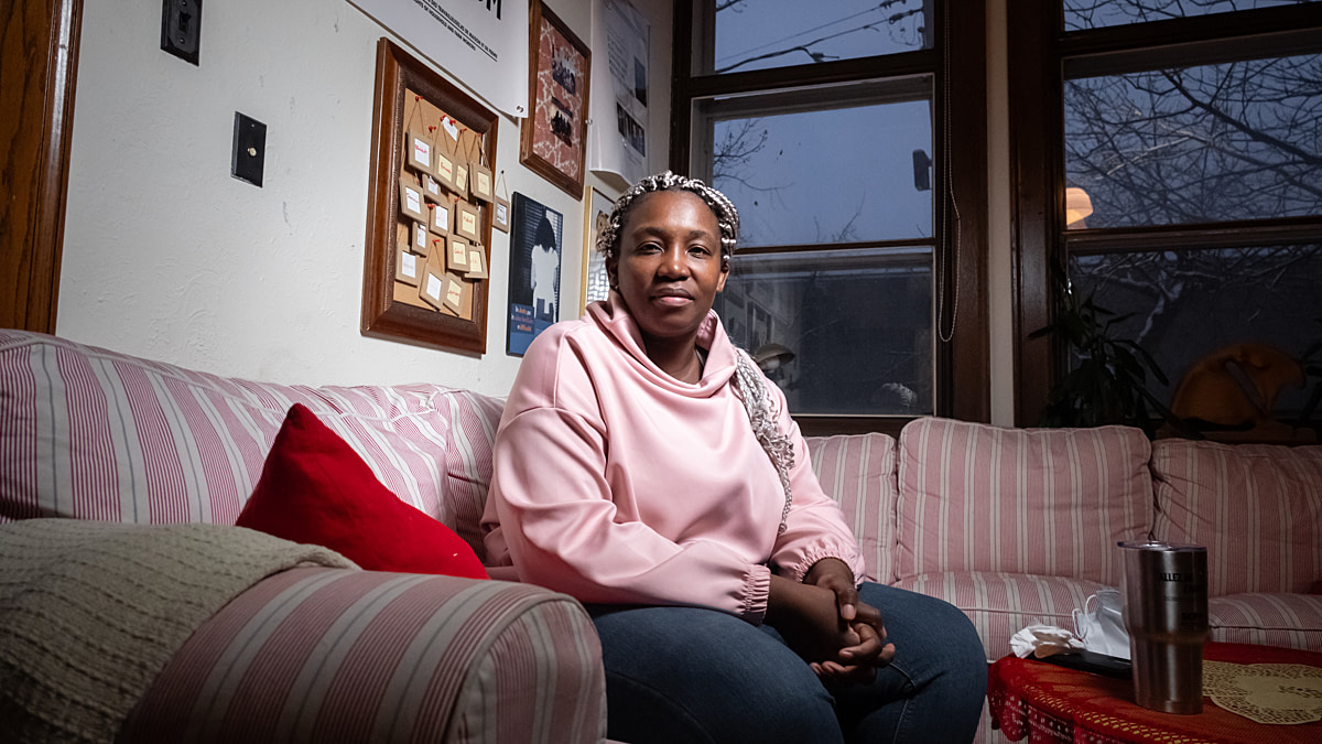 A portrait of Bénédicte Carole Ze a former farmworker and an education and mobilization officer with the Association for the Rights of Household and Farm Workers. Undisclosed location, Montreal, Quebec, Canada, 2025. Ira Moon / We Animals