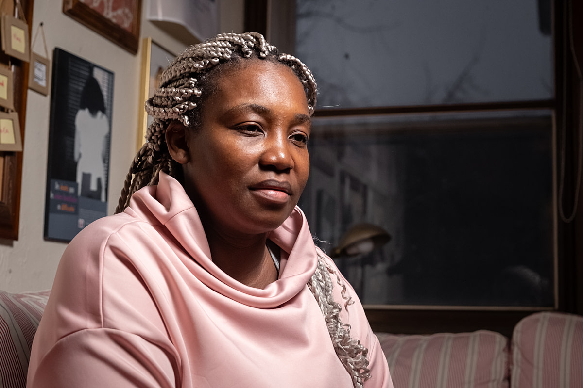 A portrait of Bénédicte Carole Ze a former farmworker and an education and mobilization officer with the Association for the Rights of Household and Farm Workers. Undisclosed location, Montreal, Quebec, Canada, 2025. Ira Moon / We Animals