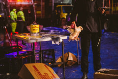 A practitioner holds a chicken by the wings as he recites a prayer of atonement during the Kapparot ritual on the eve of Yom Kippur. USA, 2022. Victoria de Martigny / We Animals