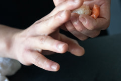 Chef Jun Sog works with WildType's cultivated salmon.