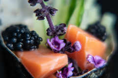 Cultivated salmon, created by WildType, in a hand roll made by Chef Jun Sog.