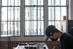 Chef Jun Sog works with Wildtype's cultivated salmon in their test kitchen in San Francisco.