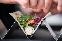 Chef jun Sog carefully prepares Wildtype's cultivated salmon and other beautiful ingredients in their test kitchen in San Francisco.