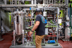 Marc Morgan, a team member at The Better Meat Company, monitors a fermenter where microbes are turned into animal-free meats from Rhiza mycoproteins. The Better Meat Company grows and sell these healthful fermented proteins to companies to use as blended or fully animal-free meats.