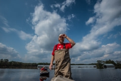 Local activist Eric Phelps from organization Brother Wolf surverys the flooding in the town of Wallace, North Carolina.