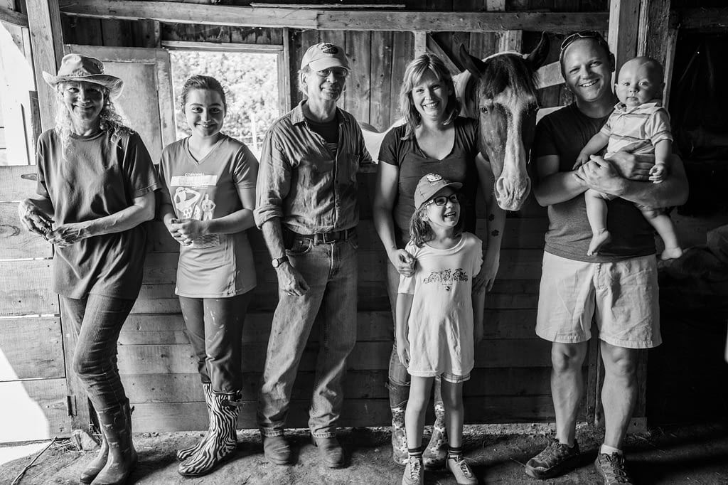 Karyn Boswell with her family and some of the staff and volunteers at Penny Lane Sanctuary.