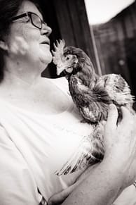 Patty Mark and a rescued hen