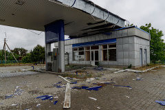 A gas station, destroyed by Russian shelling, from which four kittens were rescued and evacuated by the UAnimals team. Located near the frontlines, the area is under constant drone and artillery attacks. The kittens will be transported to an animal shelter in another location. 