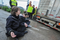 Protesters stop trucks from entering a slaughterhouse in Toronto.