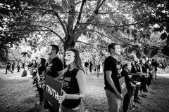 Cube of Truth, Toronto. Activists hold signs and videos showing animal abuse, and also speak with people who stop by to see their display about veganism and animal rights.