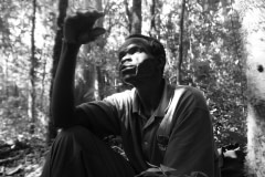 Ofen taking a rest during snare removal  in the Budongo Forest. Uganda, 2009.