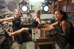 Jo, Amber, and Christine, goofing around the Bob Barker's moving galley. Photo: Ben