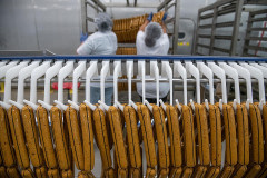 Just-cooked Tofurky sausages will be skinned, weighed, packaged, labelled and shipped worldwide.