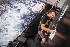 Chuck, adding the Sea Shepherd insignia to the side of the Bob Barker while departing Mauritius. 2009.