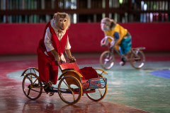 Cycling, crab-eating macaques at an amusement park in Ho Chi Minh City. Vietnam, 2018. Aaron Gekoski / HIDDEN / We Animals Media