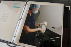 A binder of images and text about animal use in labs. USA, 2008.