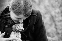 Lina Lind Christensen with a rescued hen. Denmark, 2015.